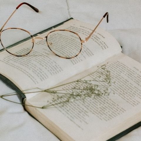 BOOK AND GLASSES FOR A GOOD DAY